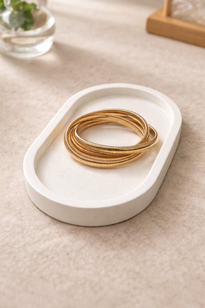Auric Coil Statement Bracelet
